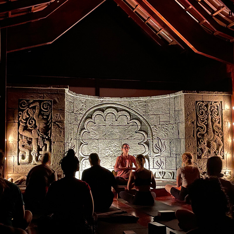 Group meditation focused on mindfulness, self-awareness, and intentional living as part of the SMARTER Living™ experience